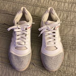 Adidas APE 779001 Size 9 1/2 US. White only worn 2x on indoor basketball court.